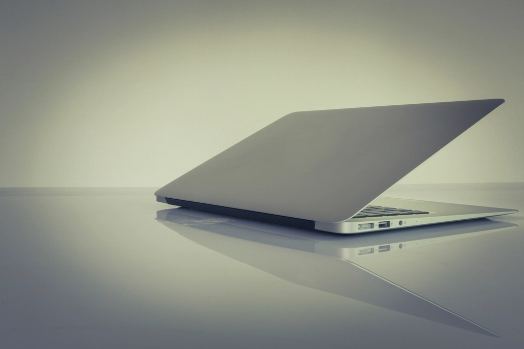 Marketing analytics dashboard on a laptop, used to track law firm lead generation to signed cases.